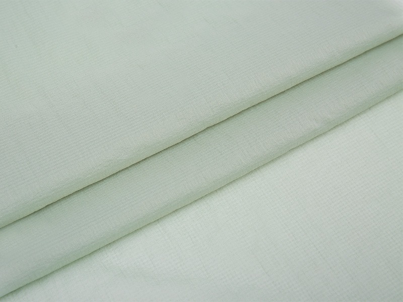Làm thế nào để polyester xen kẽ cải thiện sự thoải mái của quần áo thông qua hơi thở?